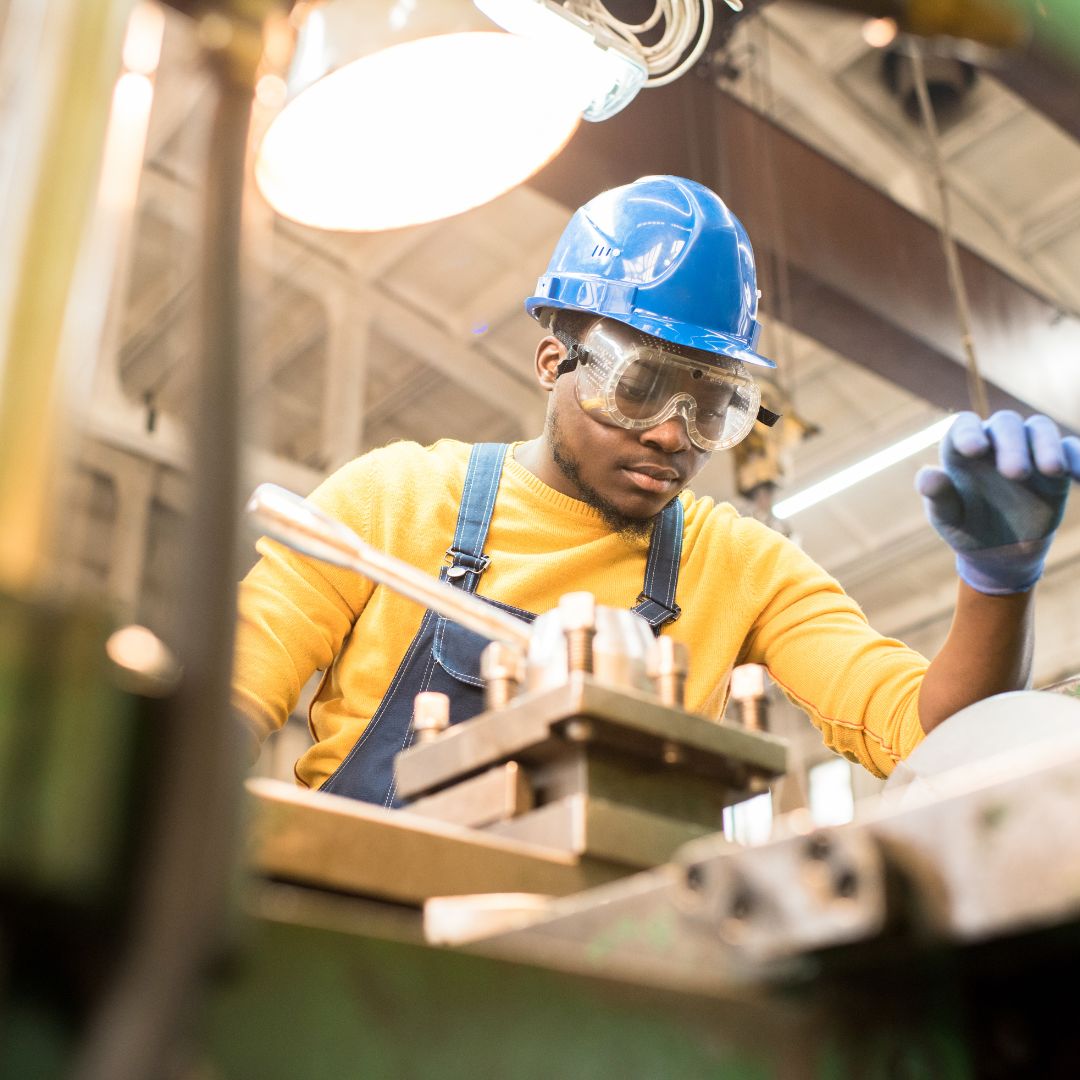 Technician working machinery